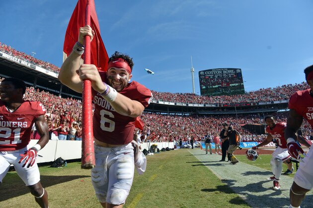 DALLAS, TX - OCTOBER 8: Quarterback Baker Mayfield #6 of the Oklahoma Sooners celebrates their victory over the Texas Longhorns by taking a lap with a Sooners flag on October 8, 2016 at The Cotton Bowl in Dallas, Texas. (Photo by Jackson Laizure/Getty Images)