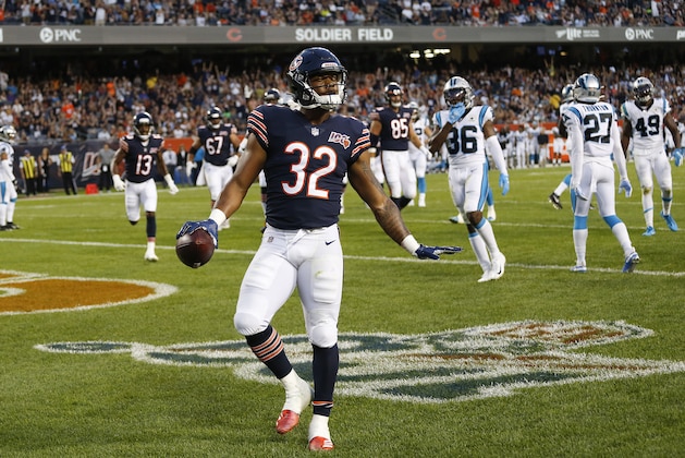 CHICAGO, ILLINOIS - AUGUST 08: David Montgomery #32 of the Chicago Bears reacts after scoring a touchdown against the Carolina Panthers during a preseason game at Soldier Field on August 08, 2019 in Chicago, Illinois. (Photo by Nuccio DiNuzzo/Getty Images)