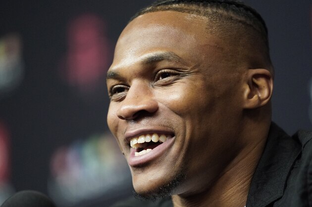 Recently acquired Houston Rockets guard Russell Westbrook answers a question during an NBA basketball news conference, Friday, July 26, 2019, in Houston. Westbrook was acquired from the Oklahoma City Thunder. (AP Photo/David J. Phillip)