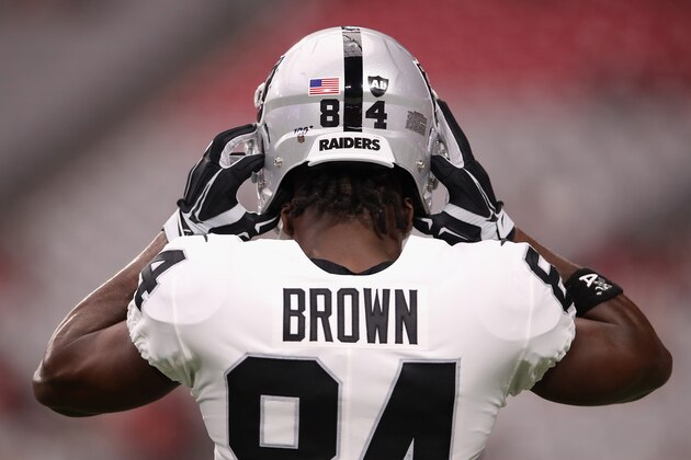 GLENDALE, ARIZONA - AUGUST 15:  Wide receiver Antonio Brown #84 of the Oakland Raiders adjusts his helmet before the NFL preseason game against the Arizona Cardinals at State Farm Stadium on August 15, 2019 in Glendale, Arizona. (Photo by Christian Petersen/Getty Images)