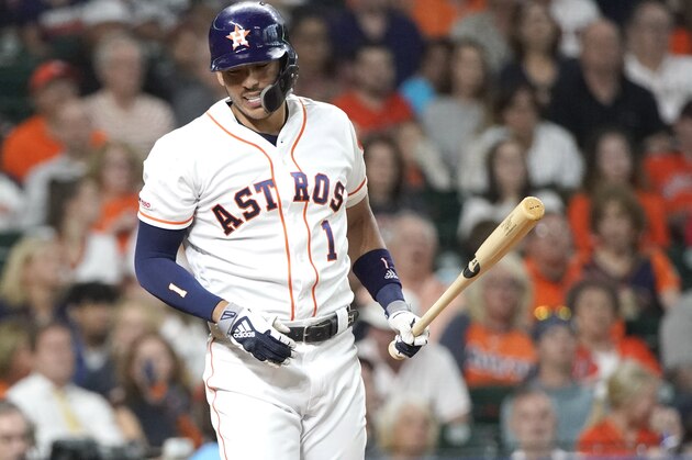 Houston Astros' Carlos Correa reacts striking out against the Detroit Tigers during the first inning of a baseball game Monday, Aug. 19, 2019, in Houston. (AP Photo/David J. Phillip)