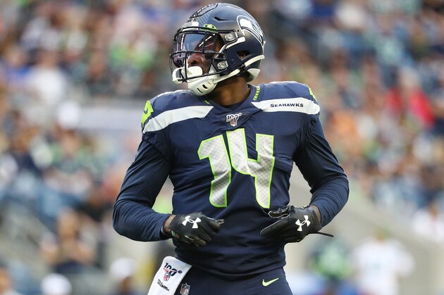 SEATTLE, WASHINGTON - AUGUST 08: D.K. Metcalf #14 of the Seattle Seahawks looks on against the Denver Broncos in the fourth quarter during their preseason game at CenturyLink Field on August 08, 2019 in Seattle, Washington. (Photo by Abbie Parr/Getty Images)
