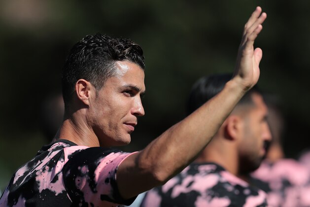 TURIN, ITALY - AUGUST 14:  Cristiano Ronaldo of Juventus greets the fans prior to the Pre-season Friendly match betewwen Juventus A v Juventus B on August 14, 2019 in Villar Perosa near Turin, Italy.  (Photo by Emilio Andreoli/Getty Images)