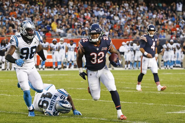 CHICAGO, ILLINOIS - AUGUST 08: David Montgomery #32 of the Chicago Bears scores a touchdown during the second quarter of a preseason gameagainst the Carolina Panthers at Soldier Field on August 08, 2019 in Chicago, Illinois. (Photo by Nuccio DiNuzzo/Getty Images)