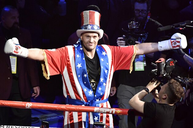 LAS VEGAS, NEVADA - JUNE 15:  Boxer Tyson Fury makes his grand entrance to fight Tom Schwarz at MGM Grand Garden Arena on June 15, 2019 in Las Vegas, Nevada. (Photo by MB Media/Getty Images)