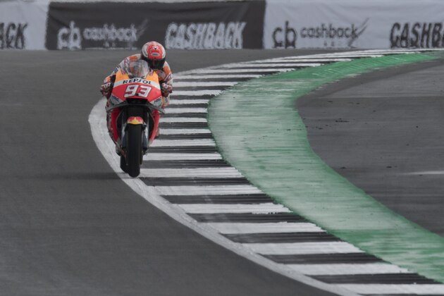 NORTHAMPTON, ENGLAND - AUGUST 25:  Marc Marquez of Spain and Repsol Honda Team heads down a straight during the qualfying practice during the MotoGp Of Great Britain - Qualifying at Silverstone Circuit on August 25, 2018 in Northampton, England.  (Photo by Mirco Lazzari gp/Getty Images)