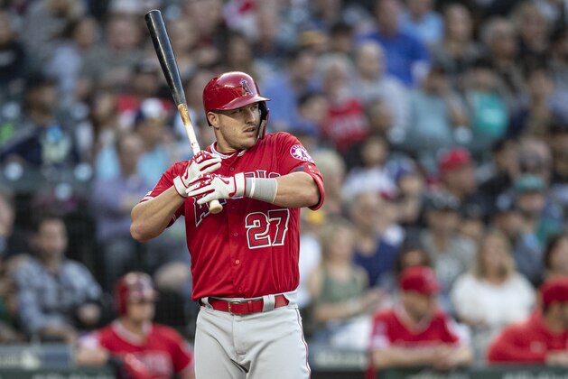 Los Angeles Angels' Mike Trout is pictrued between pitches of an at-bat durin a baseball game against the Seattle Mariners, Friday, May 31, 2019, in Seattle. The Mariners won the game 4-3. (AP Photo/Stephen Brashear)