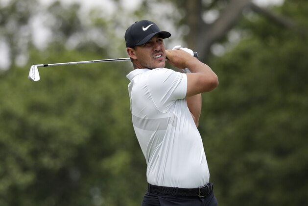 Brooks Koepka watches his tee shot on the second hole during the second round of the BMW Championship golf tournament at Medinah Country Club, Friday, Aug. 16, 2019, in Medinah, Ill. (AP Photo/Nam Y. Huh)