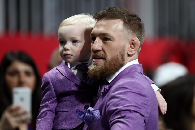 ATLANTA, GEORGIA - FEBRUARY 03: Conor McGregor and Conor McGregor Jr. attend Super Bowl LIII between the New England Patriots and the Los Angeles Rams at Mercedes-Benz Stadium on February 03, 2019 in Atlanta, Georgia. (Photo by Al Bello/Getty Images)