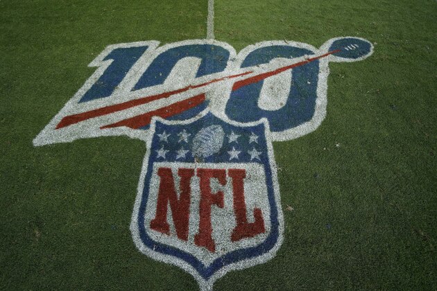 The NFL 100th anniversary logo is seen on the field during an NFL preseason football game between the Denver Broncos and the San Francisco 49ers, Monday, Aug. 19, 2019, in Denver. (AP Photo/Jack Dempsey)