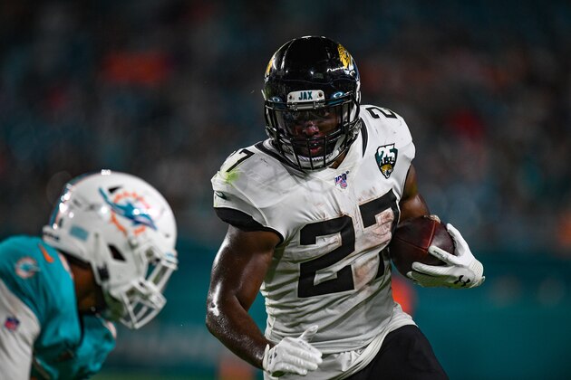 MIAMI, FL - AUGUST 22: Leonard Fournette #27 of the Jacksonville Jaguars runs with the ball in the first quarter during the preseason game against the Miami Dolphins at Hard Rock Stadium on August 22, 2019 in Miami, Florida. (Photo by Mark Brown/Getty Images)