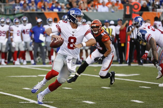 New York Giants quarterback Daniel Jones looks to pass on the run during the first half of the team's NFL preseason football game against the Cincinnati Bengals, Thursday, Aug. 22, 2019, in Cincinnati. (AP Photo/Frank Victores)