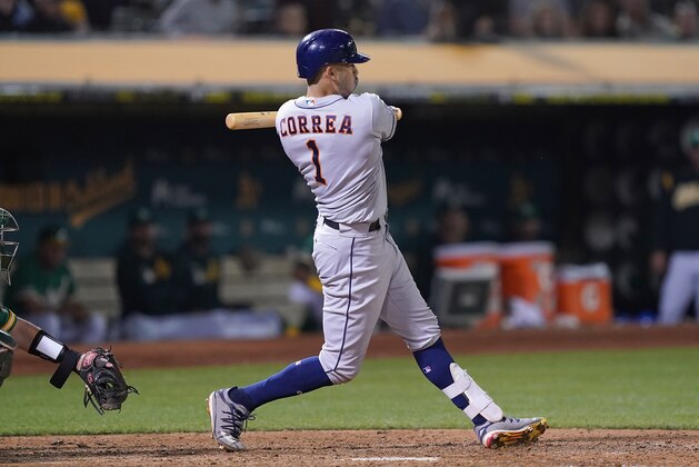 OAKLAND, CA - AUGUST 16:  Carlos Correa #1 of the Houston Astros bats against the Oakland Athletics in the top of the 13th inning at Ring Central Coliseum on August 16, 2019 in Oakland, California.  (Photo by Thearon W. Henderson/Getty Images)