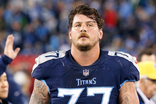 NASHVILLE, TN - DECEMBER 30:  Taylor Lewan #77 of the Tennessee Titans watches from the sideline during a game against the Indianapolis Colts at Nissan Stadium on December 30, 2018 in Nashville, Tennessee.  (Photo by Frederick Breedon/Getty Images)