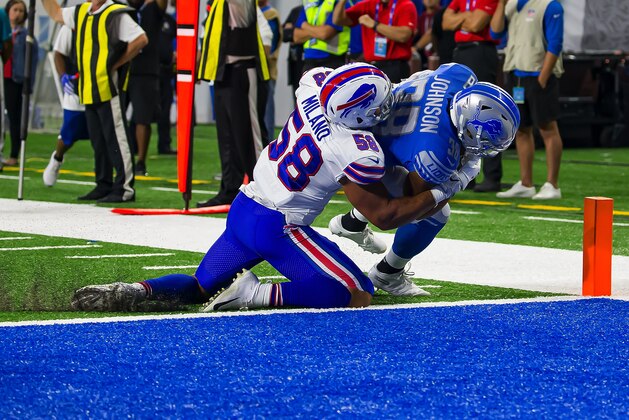 DETROIT, MI - AUGUST 23: Ty Johnson #38 of the Detroit Lions fights off a tackle from Matt Milano #58 of the Buffalo Bills and scores a first half touchdown during an NFL Pre-season game at Ford Field on August 23, 2019 in Detroit, Michigan. (Photo by Dave Reginek/Getty Images)