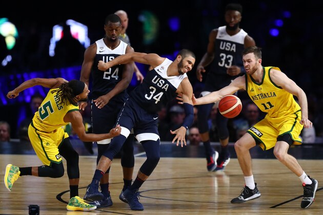 MELBOURNE, AUSTRALIA - AUGUST 24: Patty Mills of the Boomers (L) and Nicholas Kay of the Boomers steal the ball from Jayson Tatum of the USA during game two of the International Basketball series between the Australian Boomers and United States of America at Marvel Stadium on August 24, 2019 in Melbourne, Australia. (Photo by Kelly Defina/Getty Images)