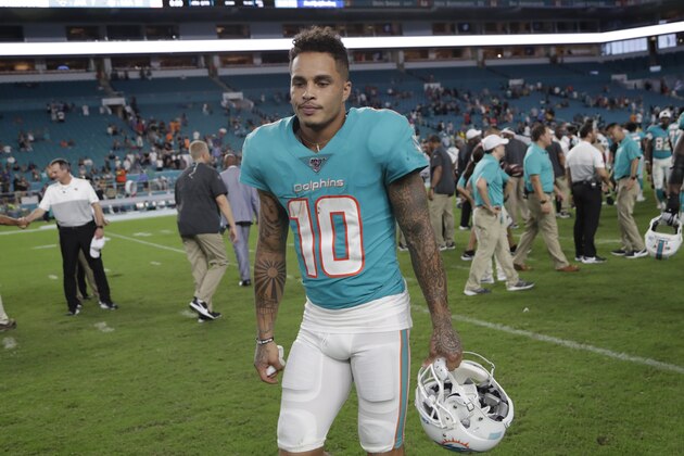 Miami Dolphins wide receiver Kenny Stills walks off the field after an NFL football preseason game against the Jacksonville Jaguars, Thursday, Aug. 22, 2019 in Miami Gardens, Fla. The Dolphins defeated the Jaguars 22-7. (AP Photo/Lynne Sladky)