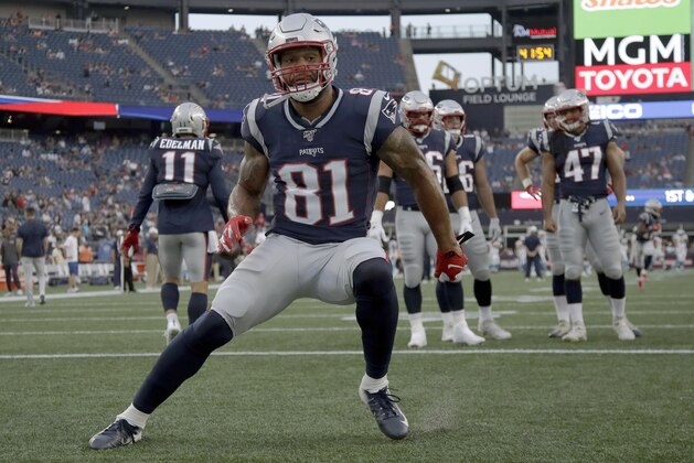 New England Patriots tight end Lance Kendricks warms up before an NFL preseason football game against the Carolina Panthers, Thursday, Aug. 22, 2019, in Foxborough, Mass. (AP Photo/Elise Amendola)