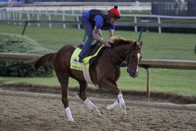 Kentucky Derby entrant Code of Honor runs during a workout at Churchill Downs Thursday, May 2, 2019, in Louisville, Ky. The 145th running of the Kentucky Derby is scheduled for Saturday, May 4. (AP Photo/Charlie Riedel)