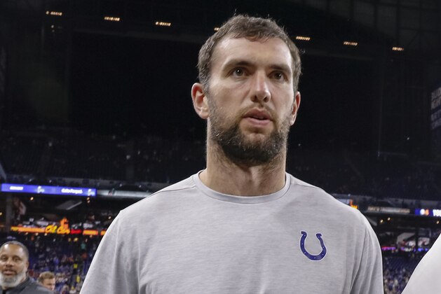 INDIANAPOLIS, IN - AUGUST 24: Andrew Luck #12 of the Indianapolis Colts walks off the field following reports of his retirement from the NFL after the preseason game against the Chicago Bears at Lucas Oil Stadium on August 24, 2019 in Indianapolis, Indiana. (Photo by Michael Hickey/Getty Images)