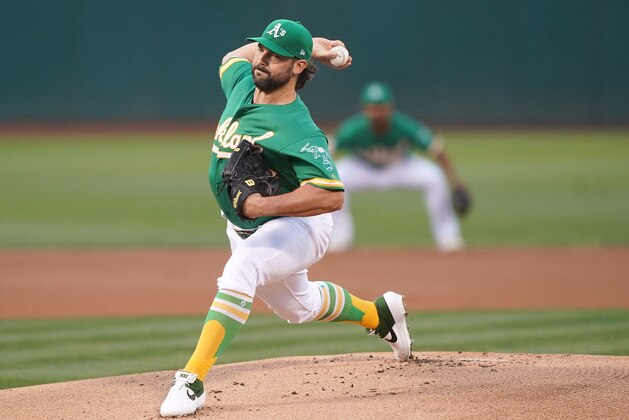 OAKLAND, CA - AUGUST 16:  Tanner Roark #60 of the Oakland Athletics pitches against the Houston Astros in the top of the first inning at Ring Central Coliseum on August 16, 2019 in Oakland, California.  (Photo by Thearon W. Henderson/Getty Images)
