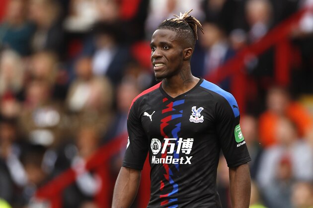 Crystal Palace's Wilfried Zaha during the English Premier League soccer match between Sheffield United and Crystal Palace at Bramall Lane in Sheffield, England, Sunday, Aug. 18, 2019. (AP Photo/Rui Vieira)