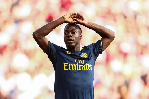 LIVERPOOL, ENGLAND - AUGUST 24: Nicolas Pepe of Arsenal reacts during the Premier League match between Liverpool FC and Arsenal FC at Anfield on August 24, 2019 in Liverpool, United Kingdom. (Photo by Robbie Jay Barratt - AMA/Getty Images)