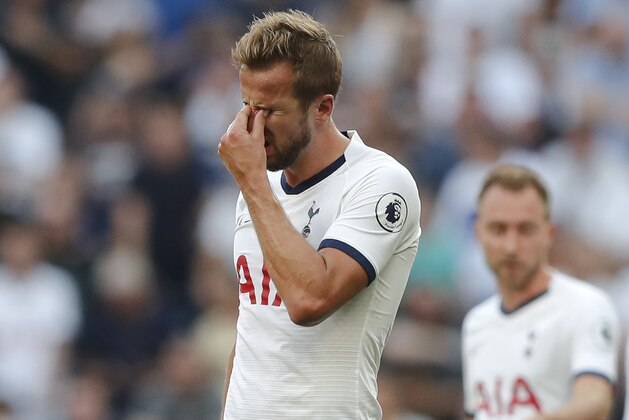 Tottenham's Harry Kane, left is dejected after missing an opportunity to score during the English Premier League soccer match between Tottenham Hotspur and Newcastle United at Tottenham Hotspur Stadium in London, Sunday, Aug. 25, 2019.(AP Photo/Frank Augstein)