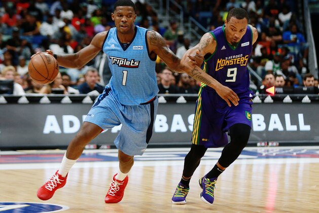 NEW ORLEANS, LOUISIANA - AUGUST 25: Joe Johnson #1 of the Triplets dribbles past Rashard Lewis #9 of the 3 Headed Monsters  during the BIG3 Playoffs at Smoothie King Center on August 25, 2019 in New Orleans, Louisiana. (Photo by Sean Gardner/BIG3 via Getty Images)