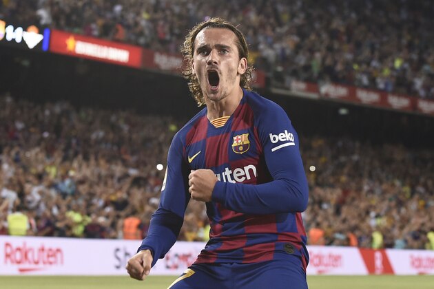 Barcelona's French forward Antoine Griezmann celebrates after scoring a second goal during the Spanish League football match between Barcelona and Real Betis at the Camp Nou stadium in Barcelona on August 25, 2019. (Photo by Josep LAGO / AFP)        (Photo credit should read JOSEP LAGO/AFP/Getty Images)