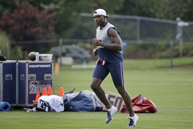 New England Patriots wide receiver Josh Gordon warms up at NFL football practice, Monday, Aug. 19, 2019, in Foxborough, Mass. (AP Photo/Elise Amendola)