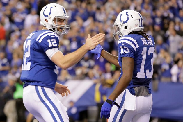 INDIANAPOLIS, IN - DECEMBER 11:  Quarterback Andrew Luck #12 and T.Y. Hilton #13 of the Indianapolis Colts celebrate after a touchdown in the fourth quarter of the game against the Houston Texans at Lucas Oil Stadium on December 11, 2016 in Indianapolis, Indiana.  (Photo by Andy Lyons/Getty Images)