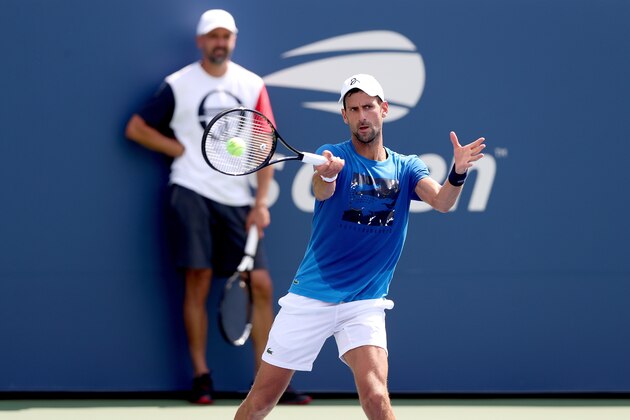 NEW YORK, NEW YORK - AUGUST 22:  Goran Ivanisevic watches Novak Djokovic of Serbia practice for the US Open at the USTA Billie Jean King National Tennis Center on August 22, 2019 in New York City. (Photo by Matthew Stockman/Getty Images)