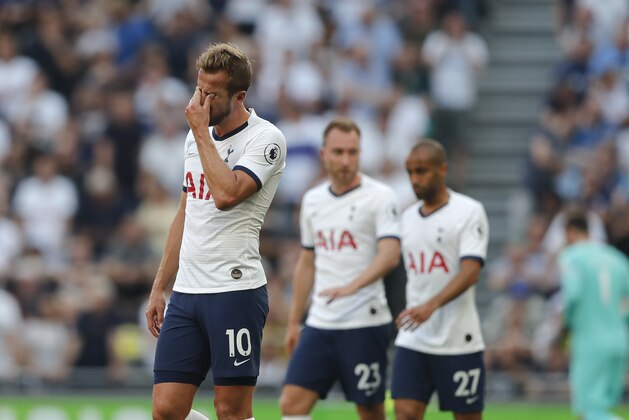 Tottenham's Harry Kane, left is dejected after missing an opportunity to score during the English Premier League soccer match between Tottenham Hotspur and Newcastle United at Tottenham Hotspur Stadium in London, Sunday, Aug. 25, 2019.(AP Photo/Frank Augstein)