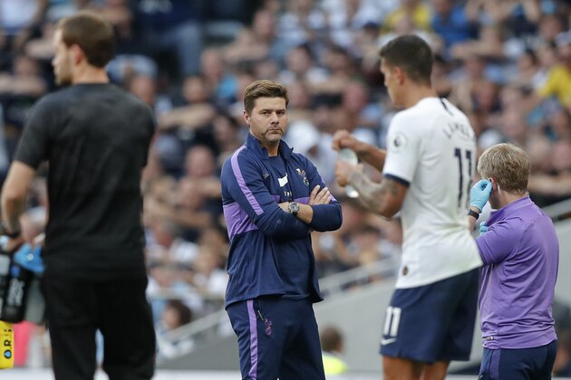Tottenham's manager Mauricio Pochettino watches the English Premier League soccer match between Tottenham Hotspur and Newcastle United at Tottenham Hotspur Stadium in London, Sunday, Aug. 25, 2019.(AP Photo/Frank Augstein)