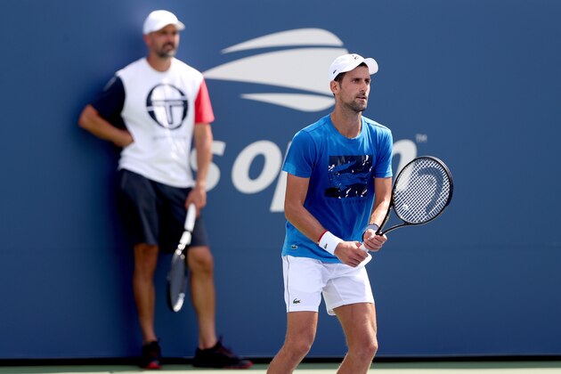 NEW YORK, NEW YORK - AUGUST 22:  Goran Ivanisevic watches Novak Djokovic of Serbia practice for the US Open at the USTA Billie Jean King National Tennis Center on August 22, 2019 in New York City. (Photo by Matthew Stockman/Getty Images)