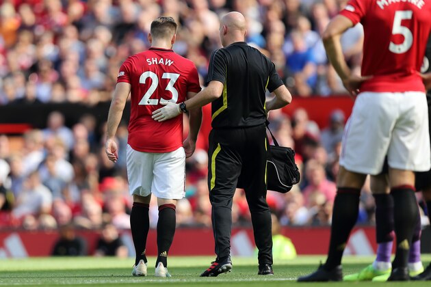 MANCHESTER, ENGLAND - AUGUST 24: Luke Shaw of Manchester United leaves the game with an injury during the Premier League match between Manchester United and Crystal Palace at Old Trafford on August 24, 2019 in Manchester, United Kingdom. (Photo by Matthew Ashton - AMA/Getty Images)