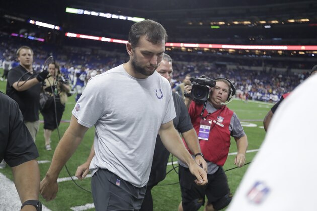 Indianapolis Colts quarterback Andrew Luck leaves the field following the team's NFL preseason football game against the Chicago Bears, Saturday, Aug. 24, 2019, in Indianapolis. Chicago won 27-17. (AP Photo/Michael Conroy)