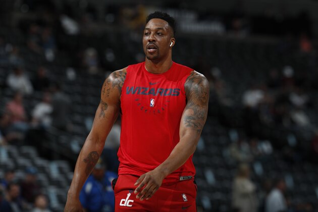 Washington Wizards center Dwight Howard (21) in the first half of an NBA basketball game Sunday, March 31, 2019, in Denver. (AP Photo/David Zalubowski)