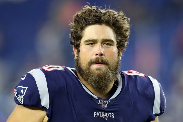 FOXBOROUGH, MASSACHUSETTS - AUGUST 22: David Andrews #60 of the New England Patriots exits the field after the preseason game between the Carolina Panthers and the New England Patriots at Gillette Stadium on August 22, 2019 in Foxborough, Massachusetts. (Photo by Maddie Meyer/Getty Images)
