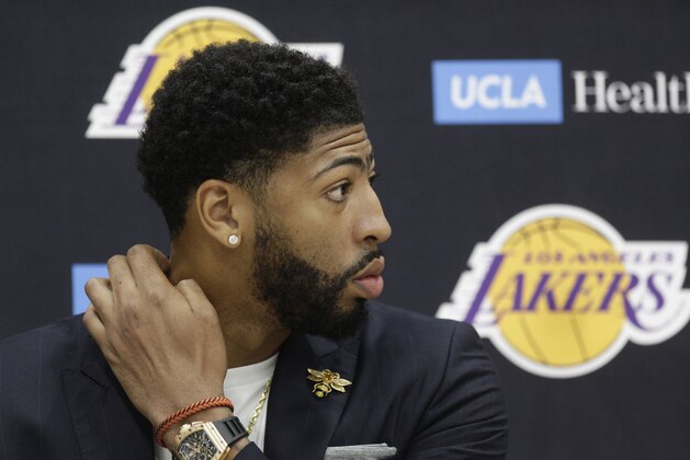 Los Angeles Lakers NBA basketball players, Anthony Davis is introduced at a news conference at the UCLA Health Training Center in El Segundo, Calif., Saturday, July 13, 2019. (AP Photo/Damian Dovarganes)
