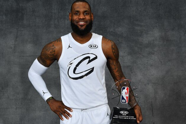 LOS ANGELES, CA - FEBRUARY 18: LeBron James #23 of Team LeBron pose for a portrait with the MVP award of the NBA All-Star 2018 game on February 18, 2018 at STAPLES Center in Los Angeles, California. NOTE TO USER: User expressly acknowledges and agrees that, by downloading and/or using this photograph, user is consenting to the terms and conditions of the Getty Images License Agreement.  Mandatory Copyright Notice: Copyright 2018 NBAE (Photo by Jesse D. Garrabrant/NBAE via Getty Images)
