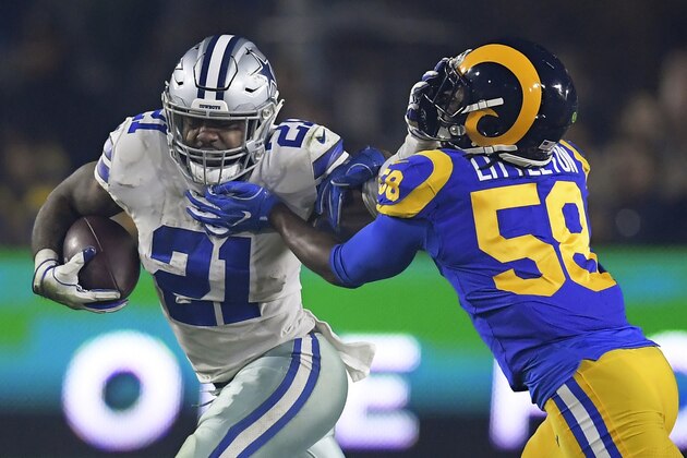 FILE - In this Jan. 12, 2019, file photo, Dallas Cowboys running back Ezekiel Elliott pushes off Los Angeles Rams inside linebacker Cory Littleton during the first half in an NFL divisional football playoff game in Los Angeles. Elliott's holdout clouds the expectations for a franchise longing to return to the Super Bowl for the first time since the last of five championships nearly 25 years ago. The Cowboys have a fourth-year quarterback already with two NFC East titles in Dak Prescott, a receiver ready to show what a full season looks like in Amari Cooper and a defense with an established star in pass rusher DeMarcus Lawrence and two emerging ones in linebackers Jaylon Smith and Leighton Vander Esch. (AP Photo/Mark J. Terrill, File)