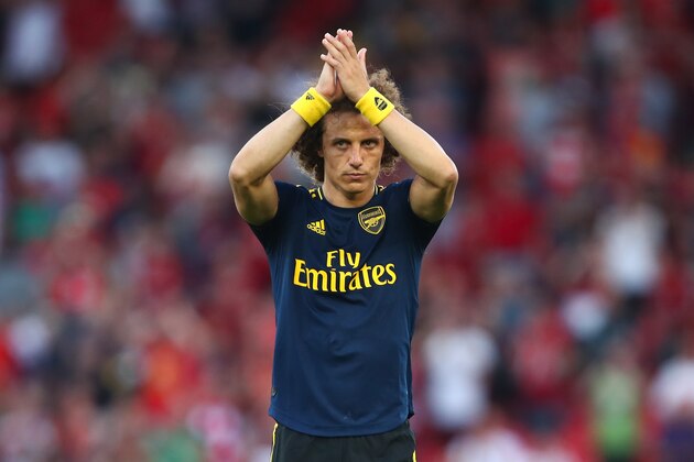 LIVERPOOL, ENGLAND - AUGUST 24: A dejected David Luiz of Arsenal applauds the fans at full time during the Premier League match between Liverpool FC and Arsenal FC at Anfield on August 24, 2019 in Liverpool, United Kingdom. (Photo by Robbie Jay Barratt - AMA/Getty Images)