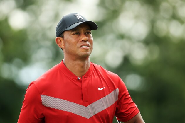 MEDINAH, ILLINOIS - AUGUST 18: Tiger Woods of the United States walks on the 18th hole during the final round of the BMW Championship at Medinah Country Club No. 3 on August 18, 2019 in Medinah, Illinois. (Photo by Andrew Redington/Getty Images)