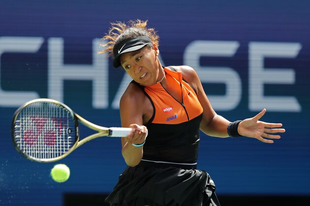 NEW YORK, NEW YORK - AUGUST 27:  Naomi Osaka of Japan returns a shot against Anna Blinkova of Russia during their Women's Singles first round match on day two of the 2019 US Open at the USTA Billie Jean King National Tennis Center on August 27, 2019 in the Flushing neighborhood of the Queens borough of New York City. (Photo by Elsa/Getty Images)