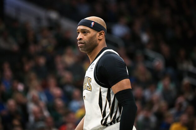MILWAUKEE, WISCONSIN - APRIL 07:  Vince Carter #15 of the Atlanta Hawks walks across the court in the second quarter against the Milwaukee Bucks at the Fiserv Forum on April 07, 2019 in Milwaukee, Wisconsin. NOTE TO USER: User expressly acknowledges and agrees that, by downloading and or using this photograph, User is consenting to the terms and conditions of the Getty Images License Agreement. (Photo by Dylan Buell/Getty Images)