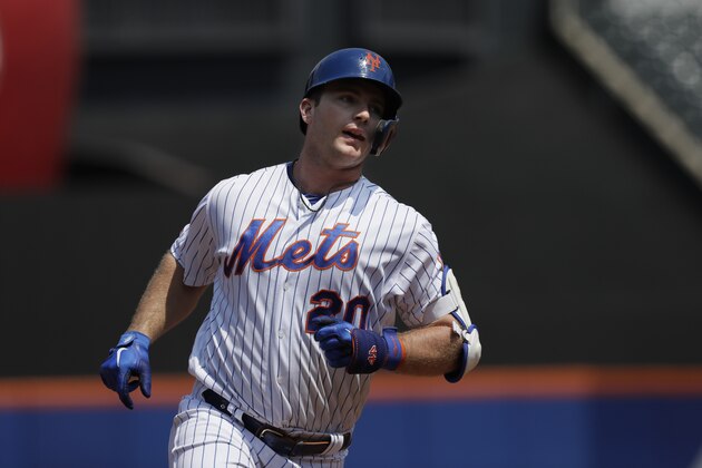 New York Mets' Pete Alonso rounds the bases with a two-run home run against the Miami Marlins in the first inning of a baseball game, Wednesday, Aug. 7, 2019, in New York. (AP Photo/Mark Lennihan)