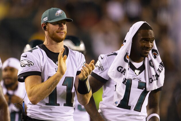 PHILADELPHIA, PA - AUGUST 22: Carson Wentz #11 and Alshon Jeffery #17 of the Philadelphia Eagles react against the Baltimore Ravens in the preseason game at Lincoln Financial Field on August 22, 2019 in Philadelphia, Pennsylvania. (Photo by Mitchell Leff/Getty Images)