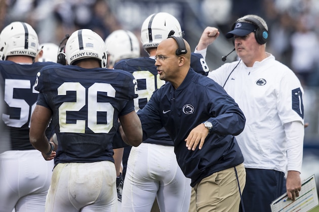 UNIVERSITY PARK, PA - SEPTEMBER 02:  Head coach James Franklin of the Penn State Nittany Lions congratulates Saquon Barkley #26 after a successful offensive drive during the game against the Akron Zips on September 2, 2017 at Beaver Stadium in University Park, Pennsylvania. Penn State defeats Akron 52-0.  (Photo by Brett Carlsen/Getty Images)